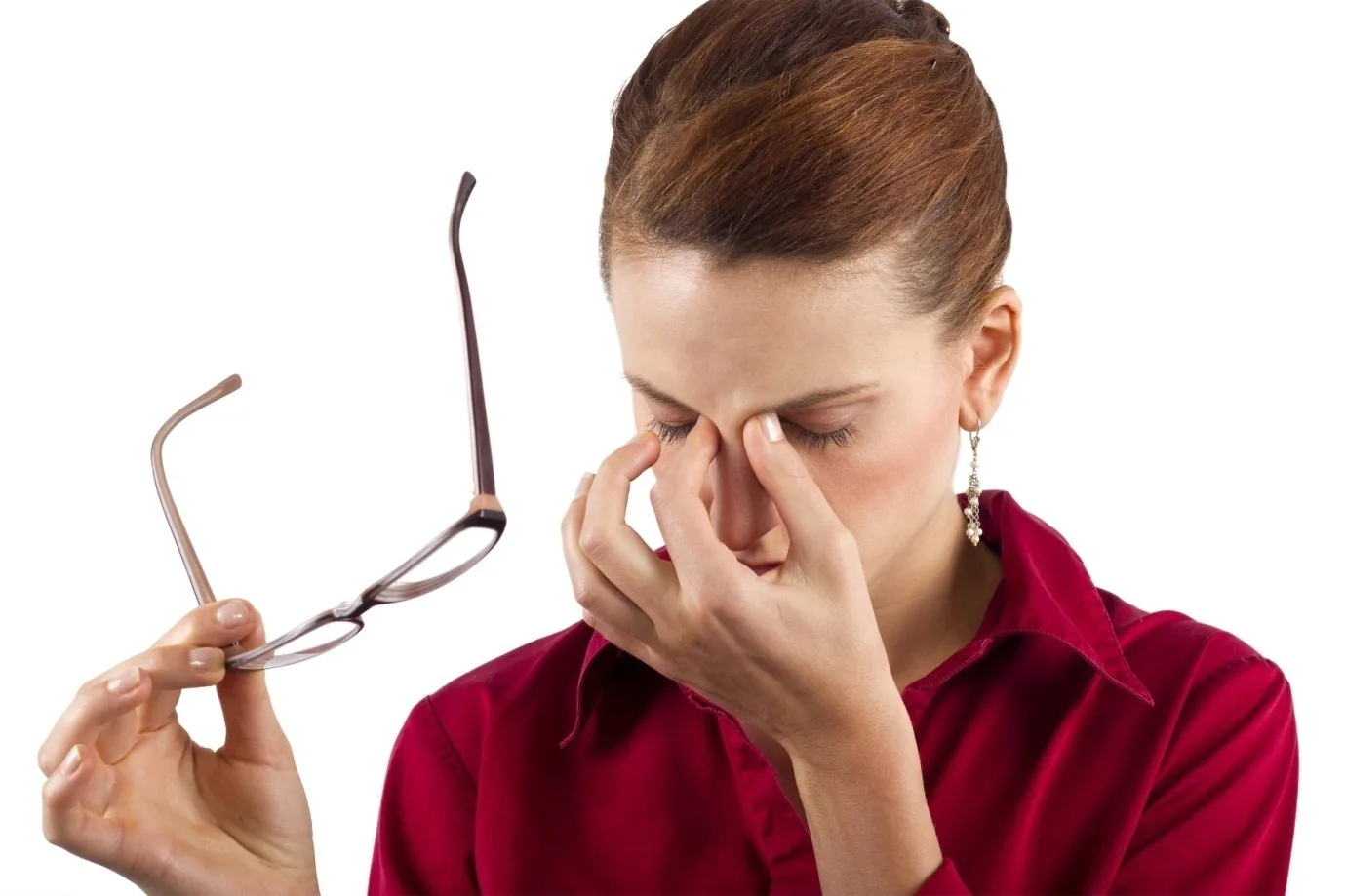 Person experiencing eye fatigue at a screen